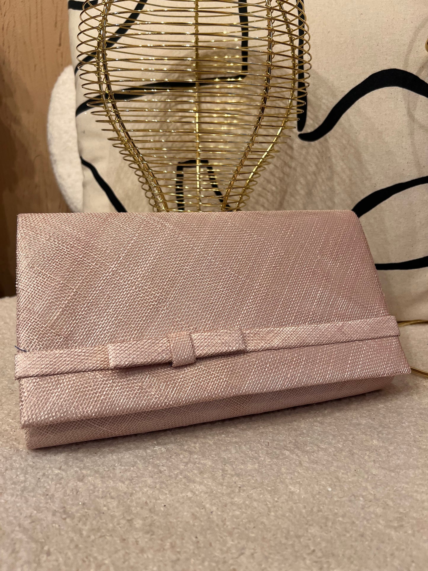 Blush pink clutch bag