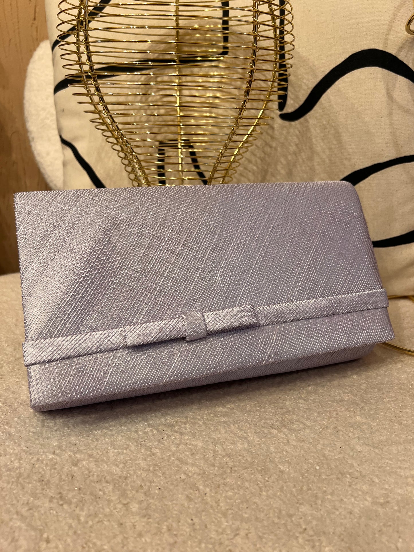 Silver clutch bag