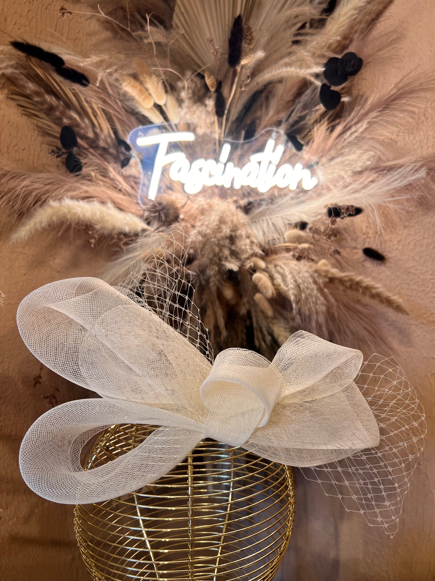 Cream floaty net fascinator