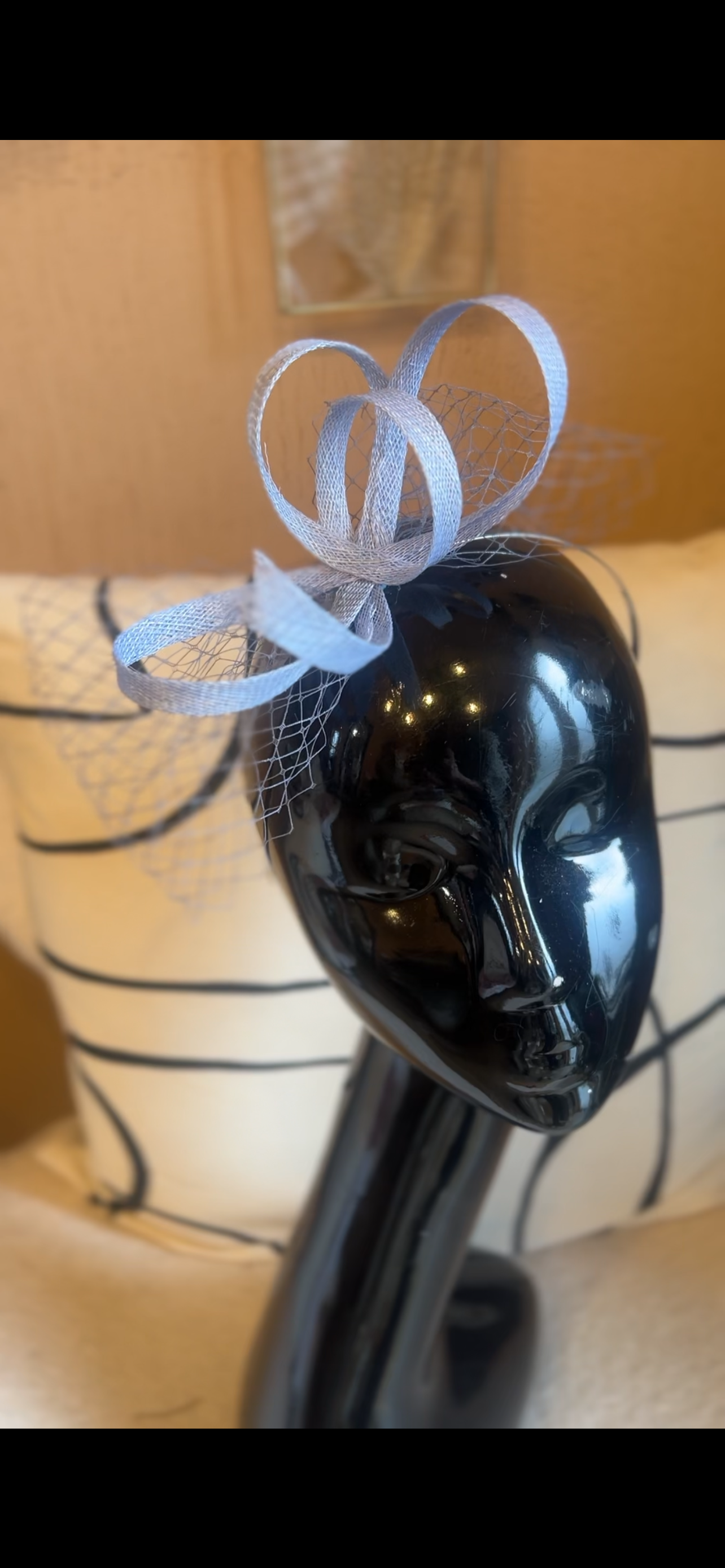 Soft blue looped fascinator